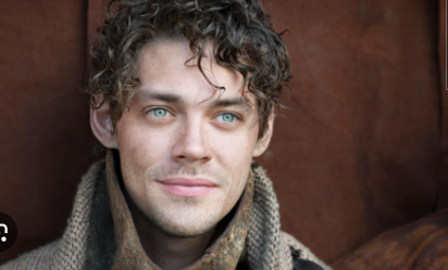 One particularly striking mix is brown wavy hair and blue eyes.